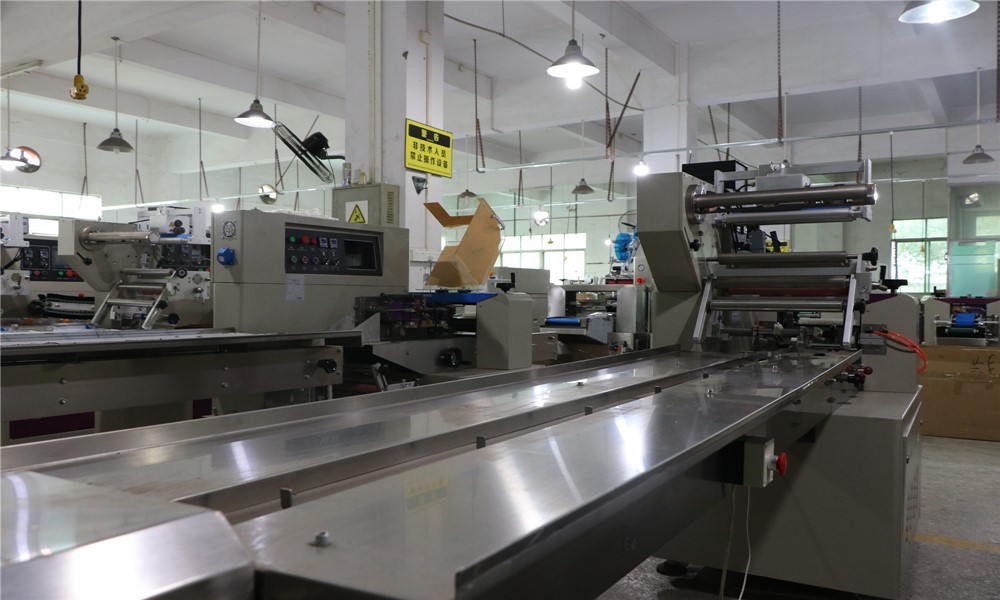 规则形状的产品采用下走膜枕式自动向日葵视频色版下载